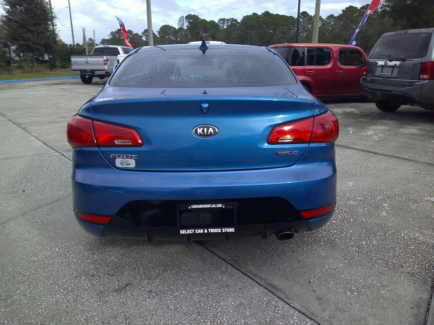 2014 BLUE KIA FORTE KOUP EX (KNAFX6A84E5) , located at 1200 Cassat Avenue, Jacksonville, FL, 32205, (904) 695-1885, 30.302404, -81.731033 - Photo#3